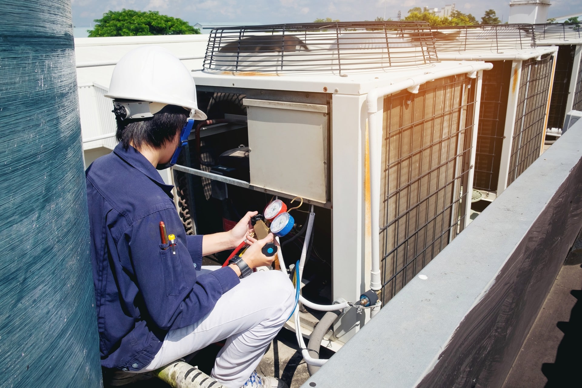 Worker fixes ventilation problems